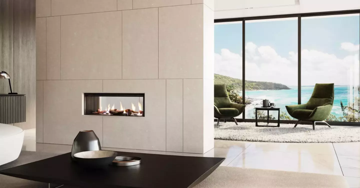 Modern luxury house with gas fireplace with the beach view from the living space