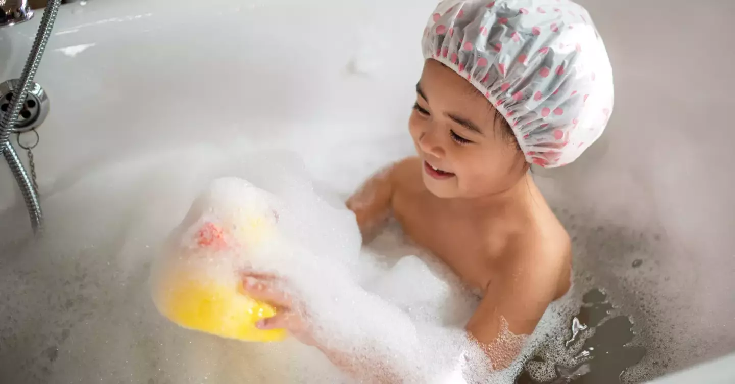 Child enjoying hot water bath