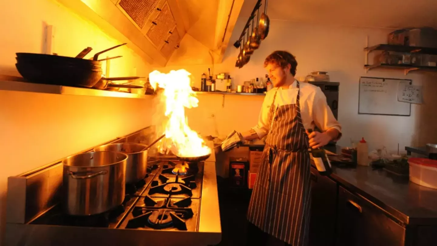Chef cooking with gas fire