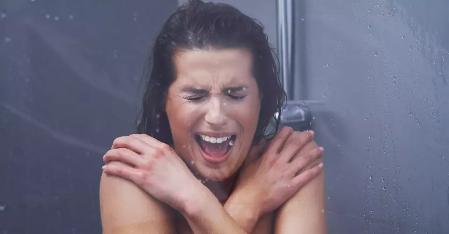 Woman in cold shower