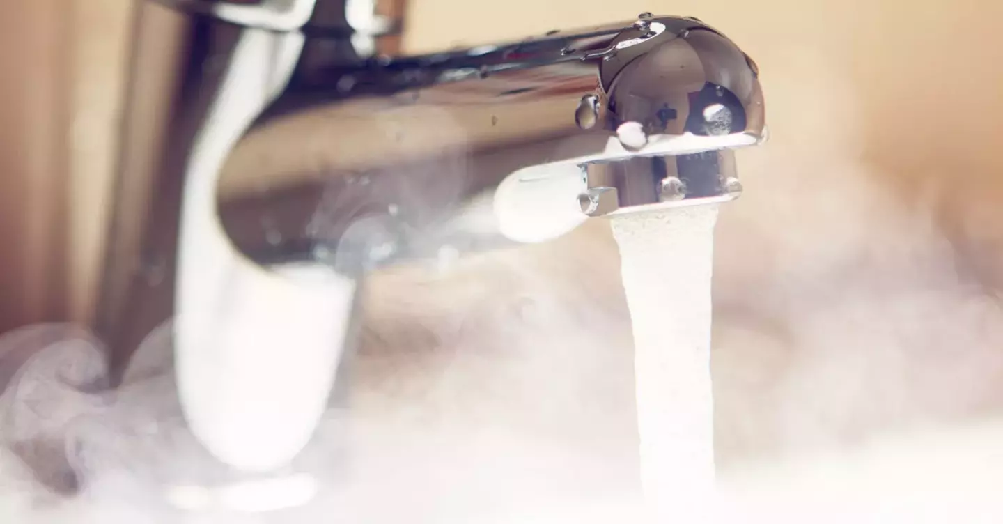 Hot water flowing from the tap